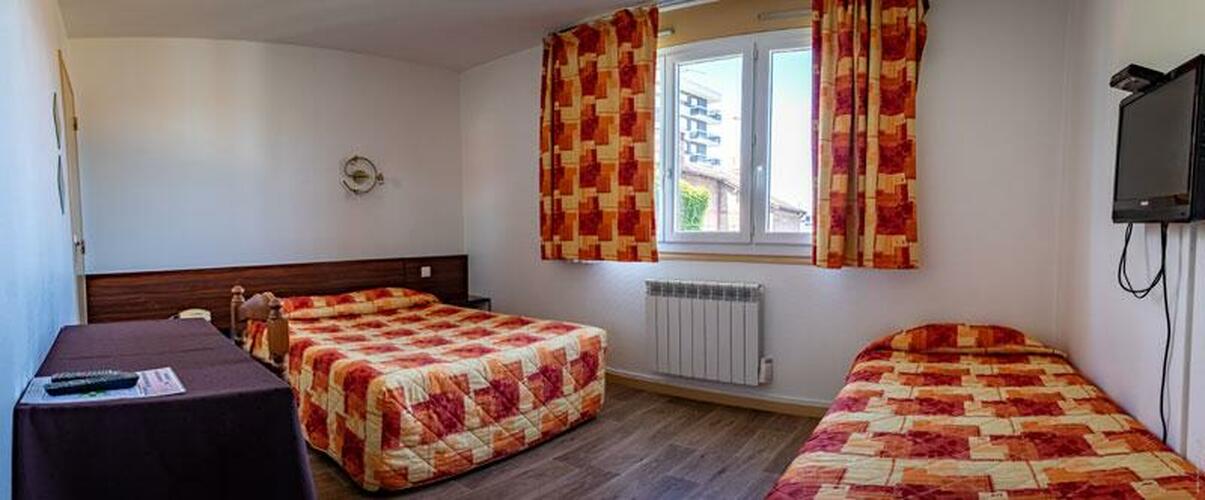 Chambres confortables pour trois personnes